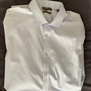 Blue striped dress shirt with French cuffs.